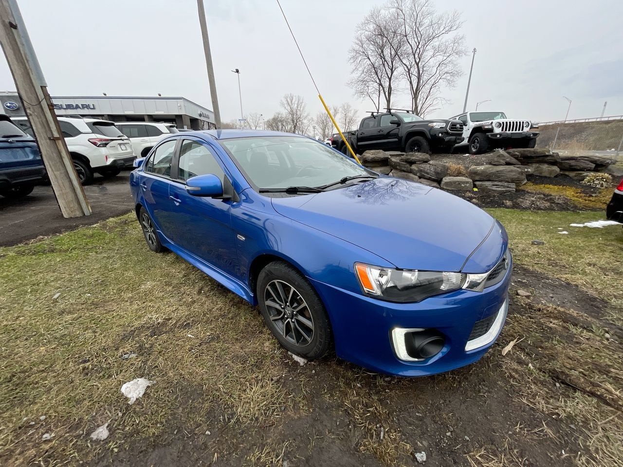 Used 2016 Mitsubishi Lancer SEL with VIN JA32V2FW3GU010606 for sale in Syracuse, NY