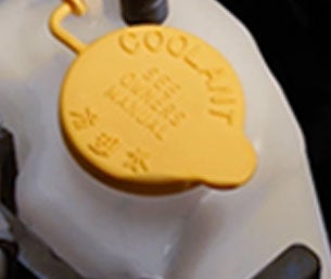 checking fluid coolant | Romano Subaru in Syracuse NY