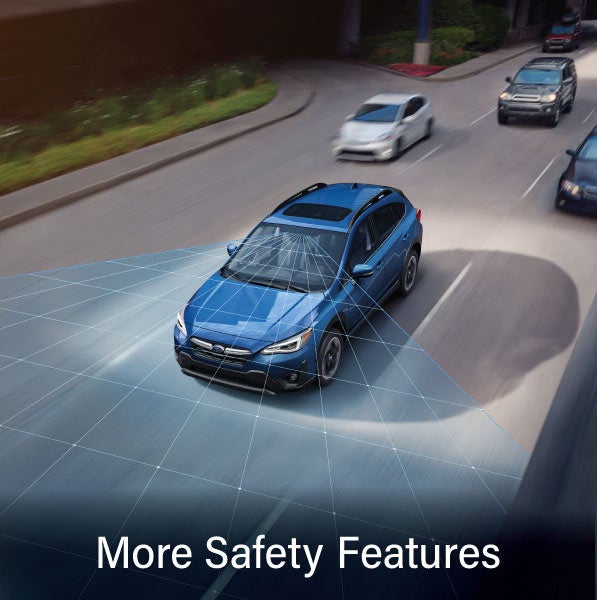 A Subaru Crosstrek in blue with the words “More Safety Features“. | Romano Subaru in Syracuse NY
