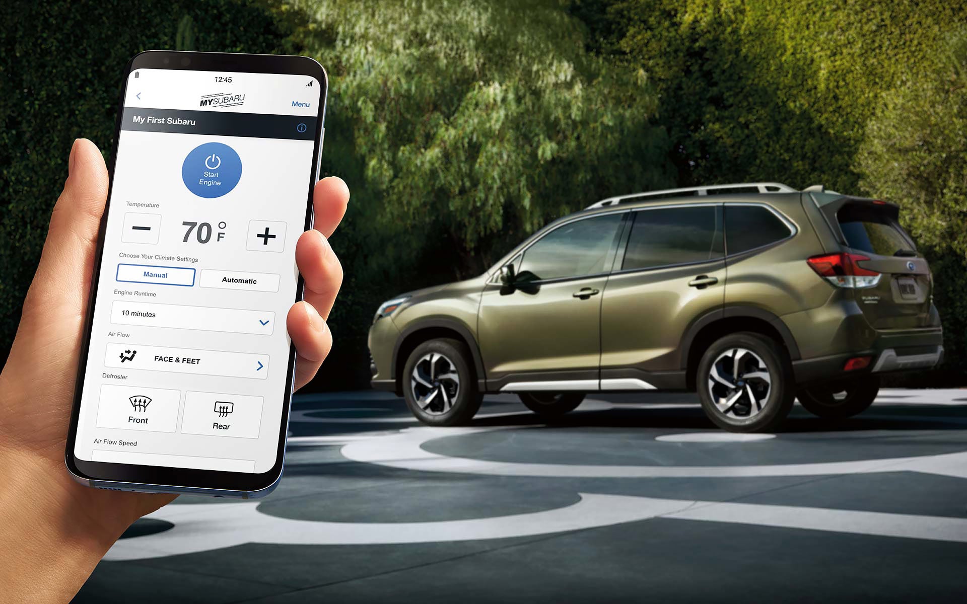 A close-up of a phone showing the Remote Engine Start with Climate Control feature of SUBARU STARLINK® Safety and Security available on the 2022 Forester. | Romano Subaru in Syracuse NY