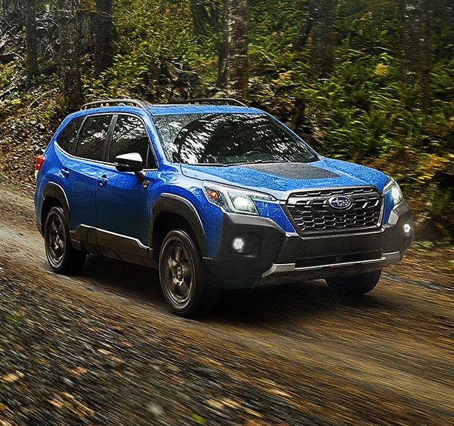 A 2022 Forester driving on a highway. | Romano Subaru in Syracuse NY