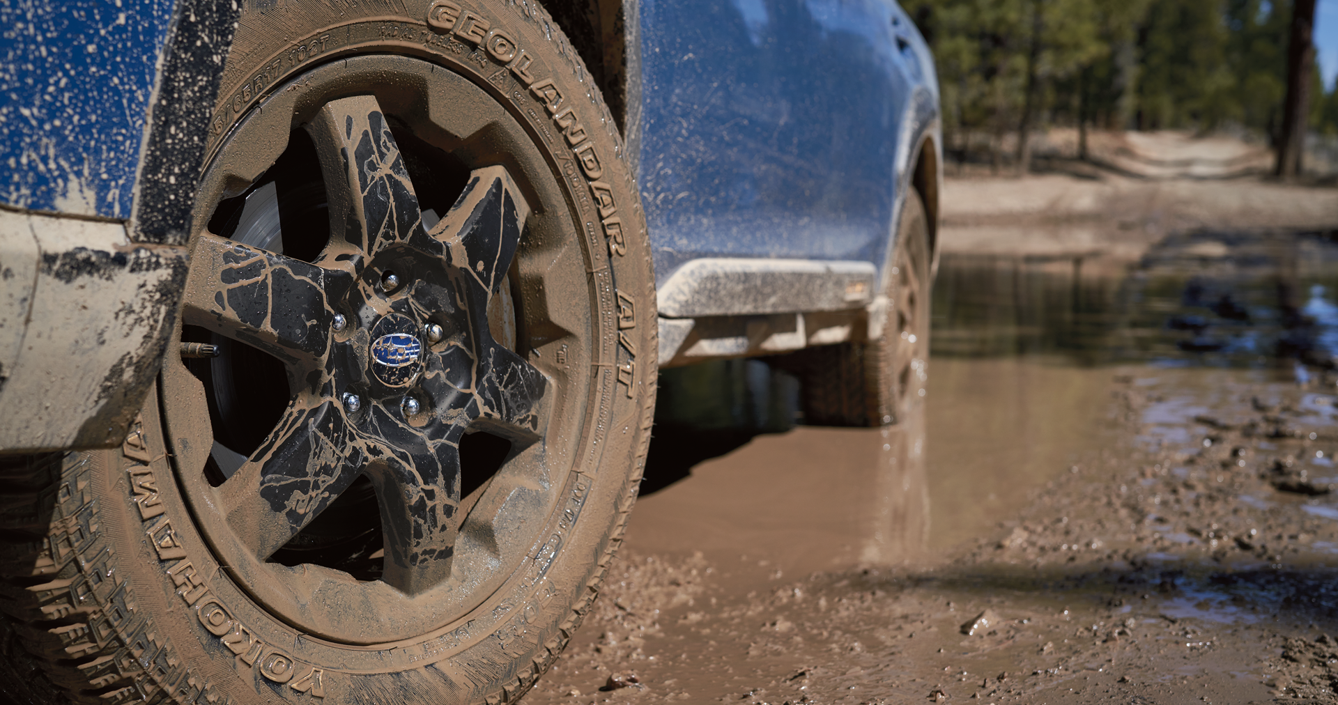 A close-up of the 17-inch off-road wheels and all-terrain Yokohama GEOLANDAR® tires on the 2023 Outback Wilderness. | Romano Subaru in Syracuse NY