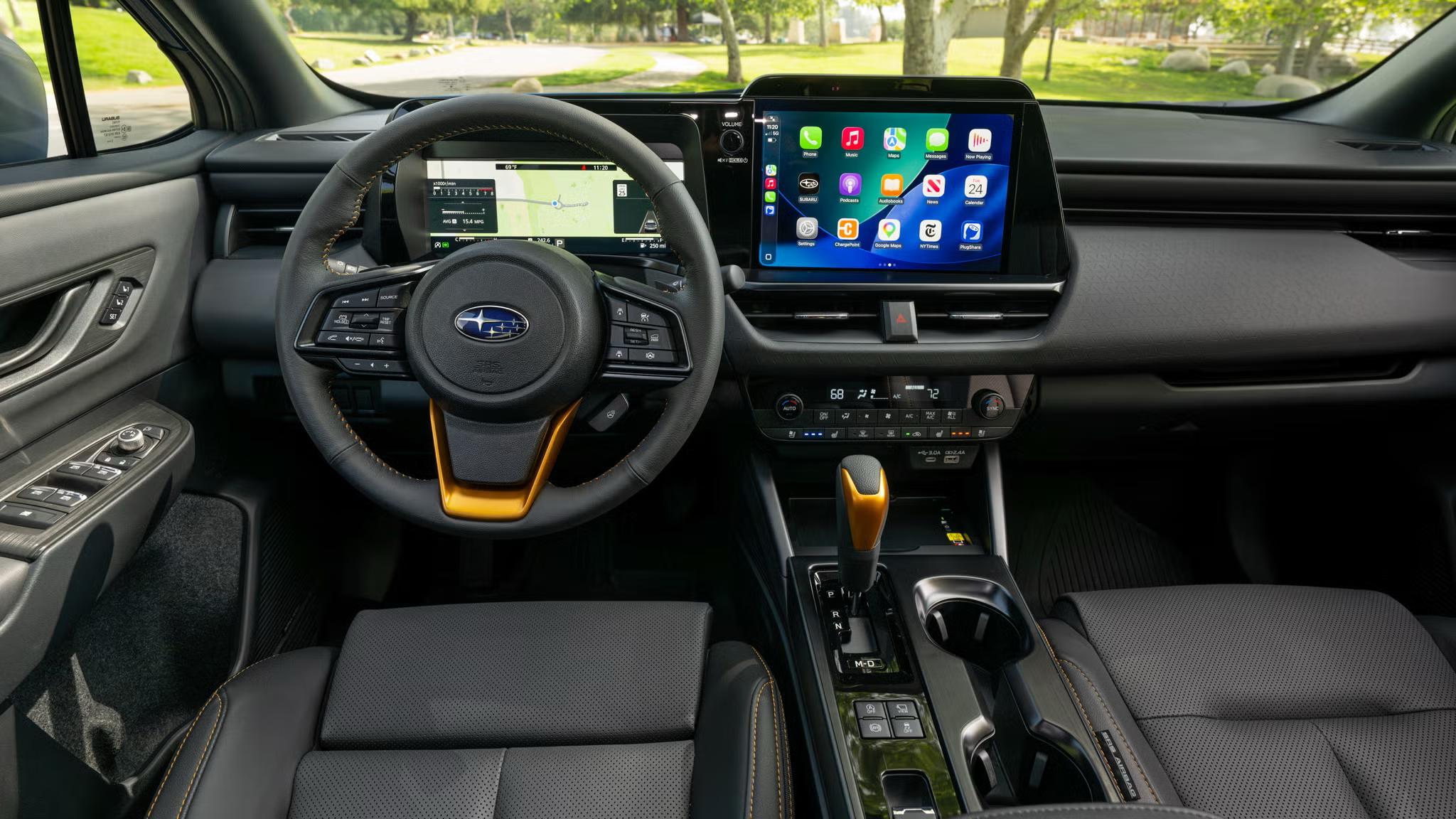 2027 Subaru Outback interior showing comfortable passenger seating and climate control display